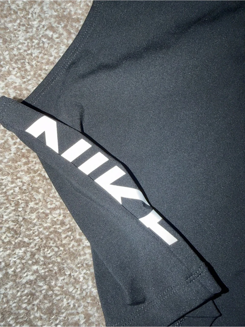 Nike Black Cropped Athletic Tank with White Swoosh